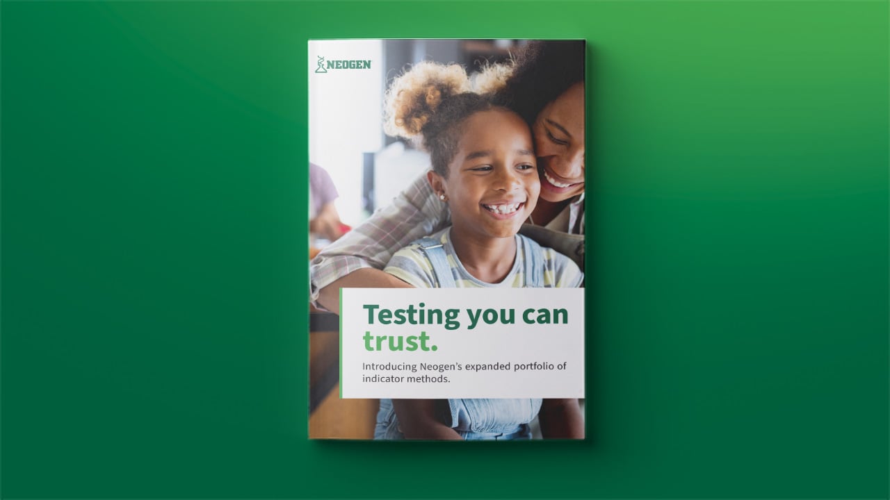 Neogen brochure featuring a mother and child with messaging about trusted quality indicator food safety testing solutions.